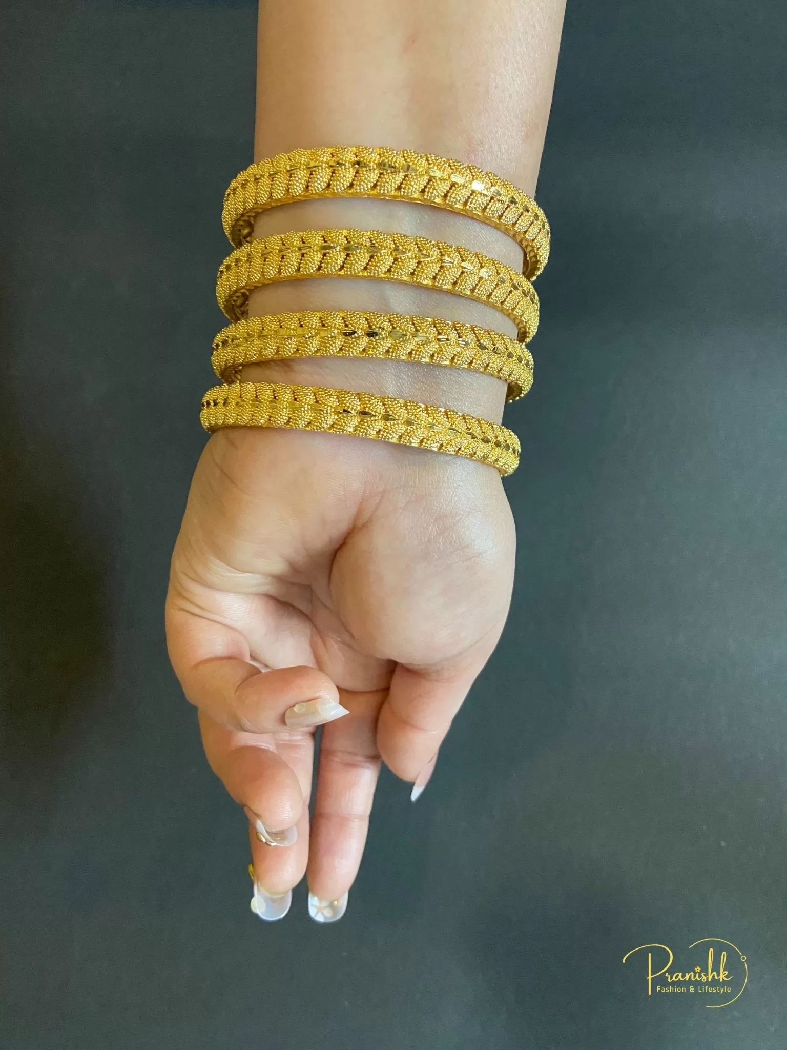 Leaf Design Gold Tone Bangles- Set of 4, Size 2.8